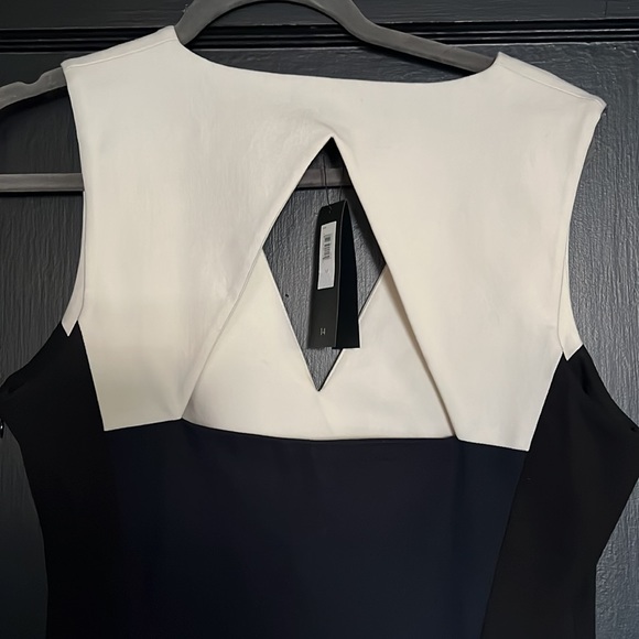black dress with a cream, top,navy insert in the front has a very detailed back - Picture 4 of 6